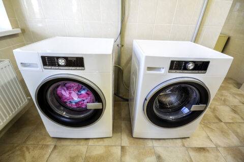 Colorful clothes and towels in washing machine