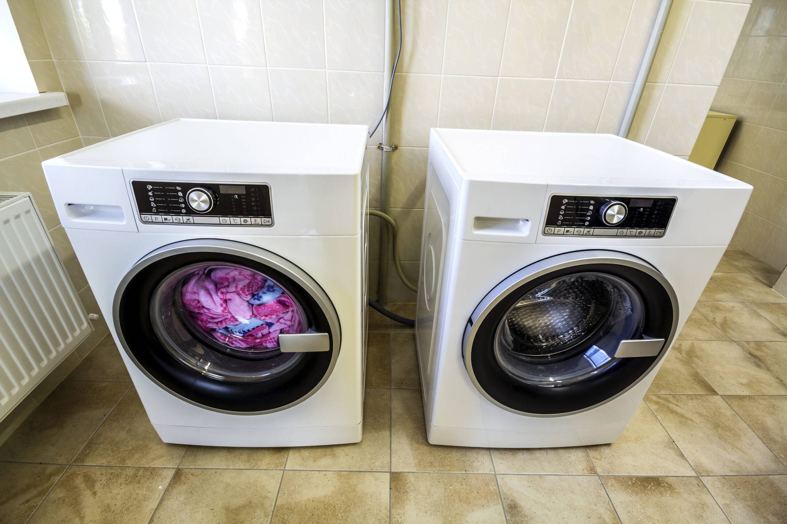 Colorful clothes and towels in washing machine