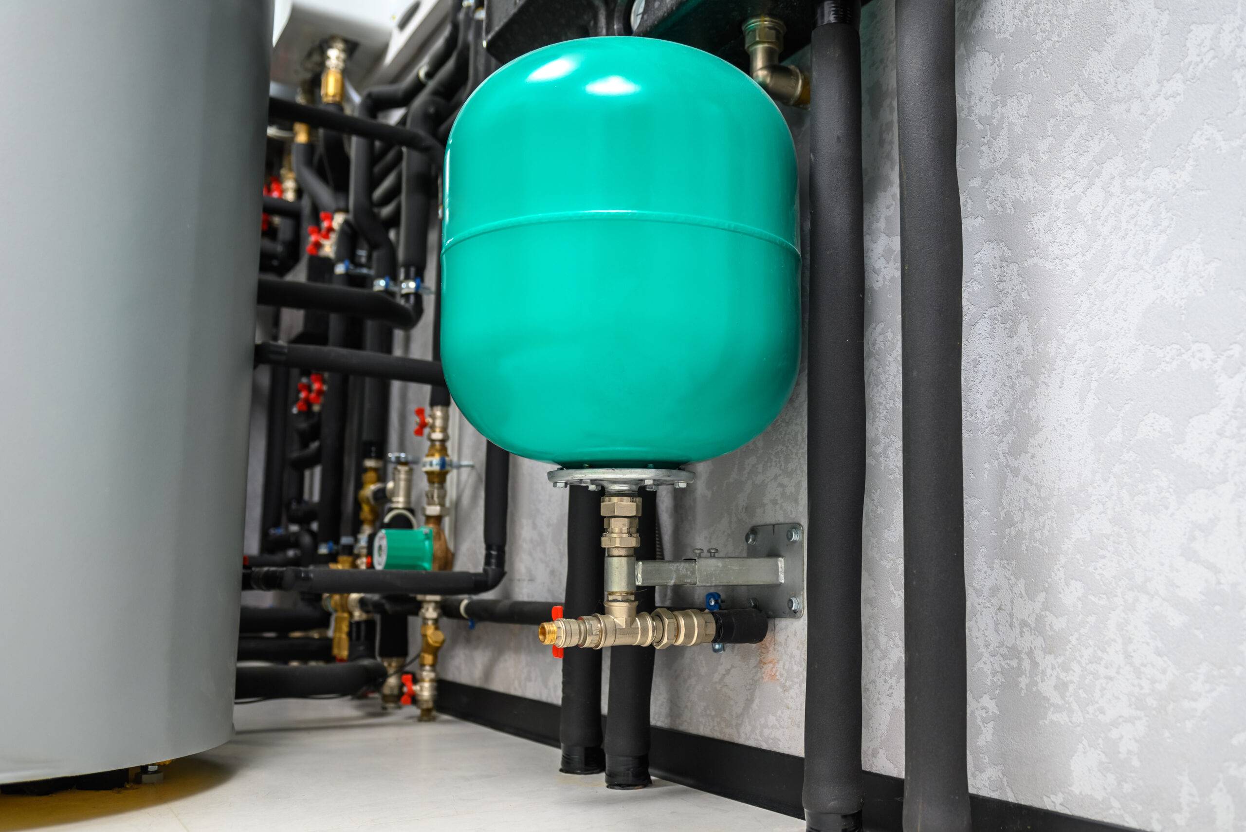 Modern electric boiler room in the house. Equipment for water heating system with automatic control unit