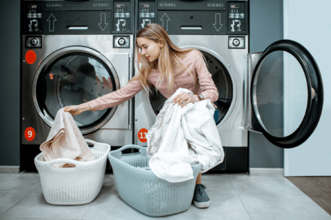 Woman sorting laundry.