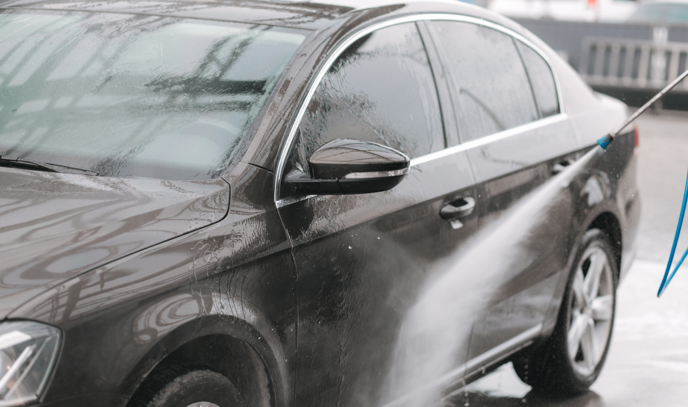 Someone washing their car.