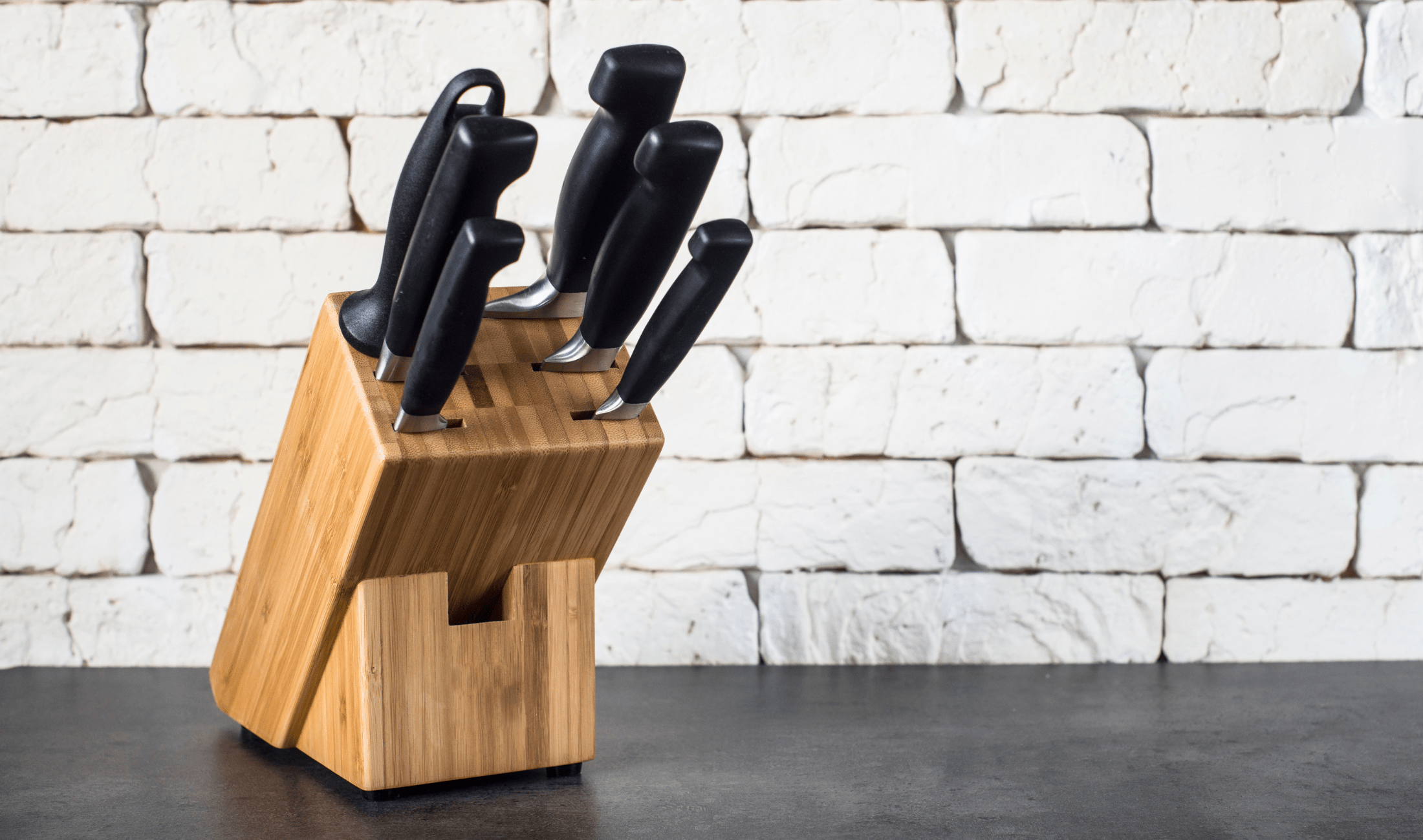 A knife block on a counter.